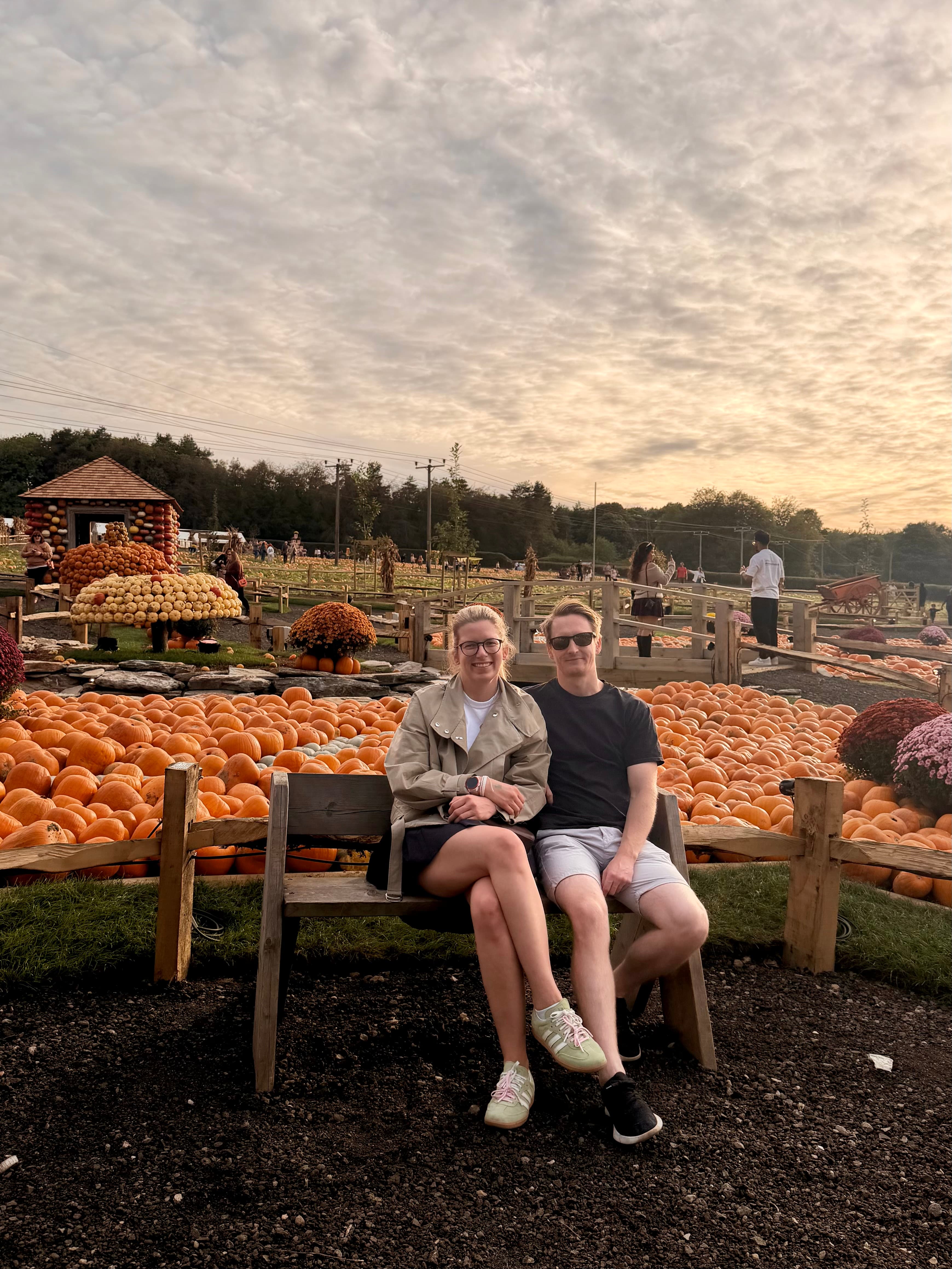 The two of us on a bench among the pumpkins